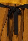 Trompe l'oeil wool sweater dress in mustard